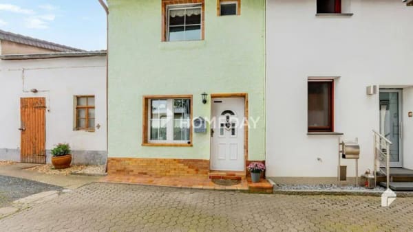 Immobilie in Langerwehe - Charmantes Reihenmittelhaus in ruhiger Traumlage mit schönem Garten - Bild 2