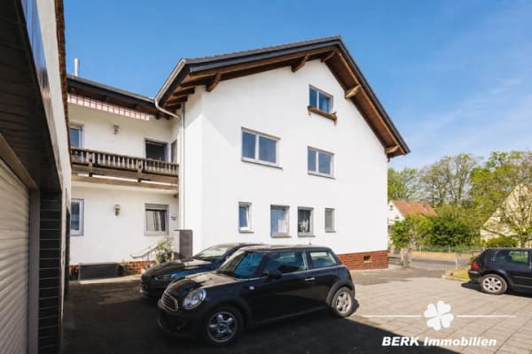 Immobilie in Stockstadt am Main - BERK Immobilien – Gepflegtes 3-Familienhaus mit großem Grundstück und vielseitigen Möglichkeiten - Bild 0