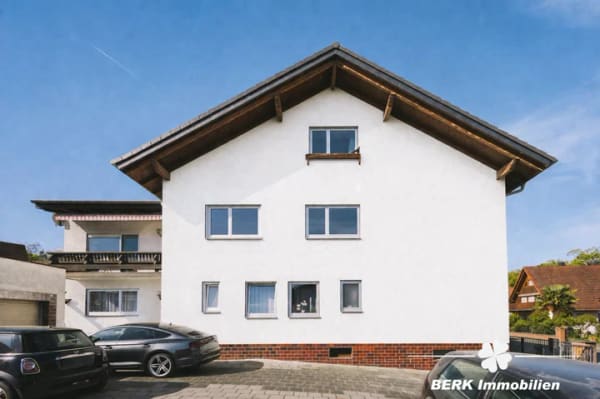 Immobilie in Stockstadt am Main - BERK Immobilien – Gepflegtes 3-Familienhaus mit großem Grundstück und vielseitigen Möglichkeiten - Bild 1