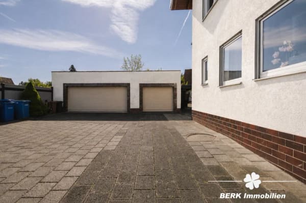 Immobilie in Stockstadt am Main - BERK Immobilien – Gepflegtes 3-Familienhaus mit großem Grundstück und vielseitigen Möglichkeiten - Bild 2