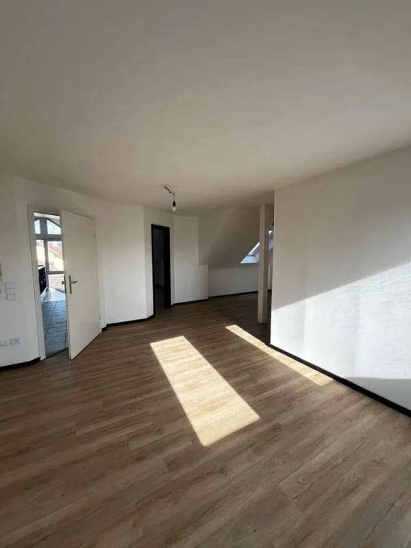 Immobilie in Obernburg am Main - Erstbezug nach DG-Ausbau: Helle 3-Zimmer-Wohnungen (ca. 64,72 m²) mit Stellplatz in Obernburg - Bild 1
