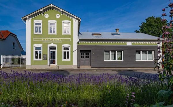 Immobilie in Gelting - Viel Platz in Gelting: Mehrfamilienhaus mit sieben Zimmern und  Gewerbeeinheit  - Bild 0