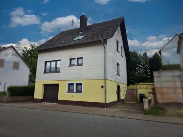 Immobilie in Dunzweiler - 1-Familienhaus mit Ausbaupotenzial: Garten, Südterrasse, 2 Garagen & optionale 2. Wohneinheit - Bild 1