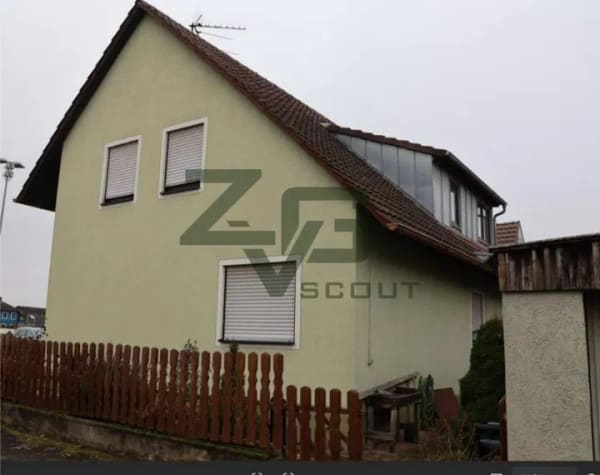 Immobilie in Wiesentheid - Wiesentheid: Einfamilienhaus mit Garage - Bild 1