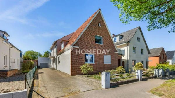 Immobilie in Bad Schwartau - Attraktives Mehrfamilienhaus mit drei Wohneinheiten und großzügigem Grundstück - Bild 2