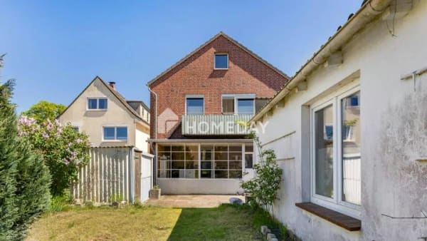 Immobilie in Bad Schwartau - Attraktives Mehrfamilienhaus mit drei Wohneinheiten und großzügigem Grundstück - Bild 3
