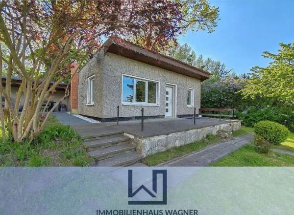 Immobilie in Neverin - Gepflegtes Eigentumsgrundstück mit teilmodernisiertem Bungalow in naturnaher Lage - Bild 0