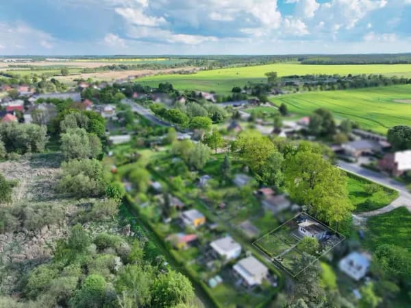 Immobilie in Neverin - Gepflegtes Eigentumsgrundstück mit teilmodernisiertem Bungalow in naturnaher Lage - Bild 1