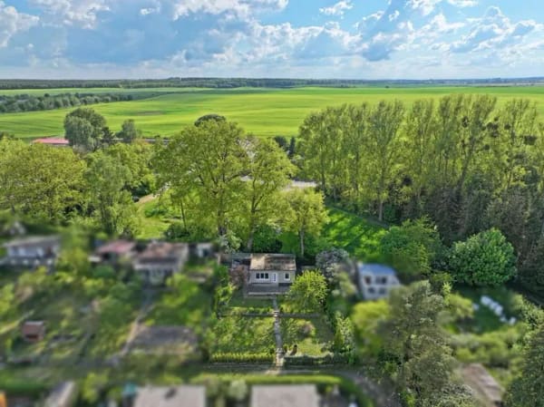 Immobilie in Neverin - Gepflegtes Eigentumsgrundstück mit teilmodernisiertem Bungalow in naturnaher Lage - Bild 4