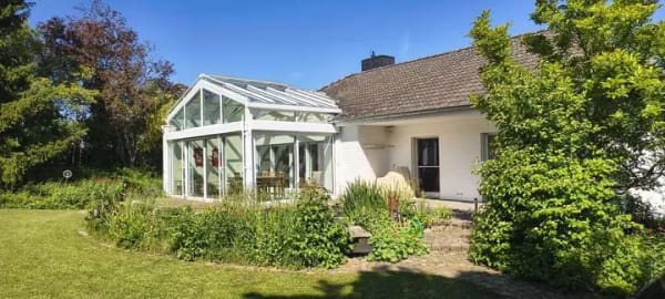 Immobilie in Bolanden - Großzügiger Bungalow mit Wintergarten in Feldrandlage und Einliegerwohnung  - Bild 4