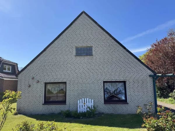 Immobilie in Wurster Nordseeküste - Siedlungshaus mit Anbau, 2 Garagen und 1 Carport - Bild 1