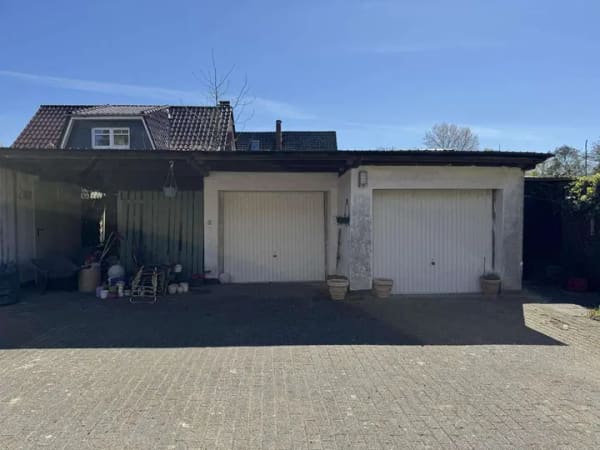 Immobilie in Wurster Nordseeküste - Siedlungshaus mit Anbau, 2 Garagen und 1 Carport - Bild 3