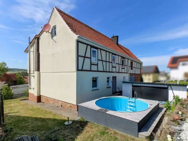 Immobilie in Großenlüder - Viel Raum für Ideen Einfamilienhaus mit Scheune Pool und großem Grundstück in Kleinlüder - Bild 0