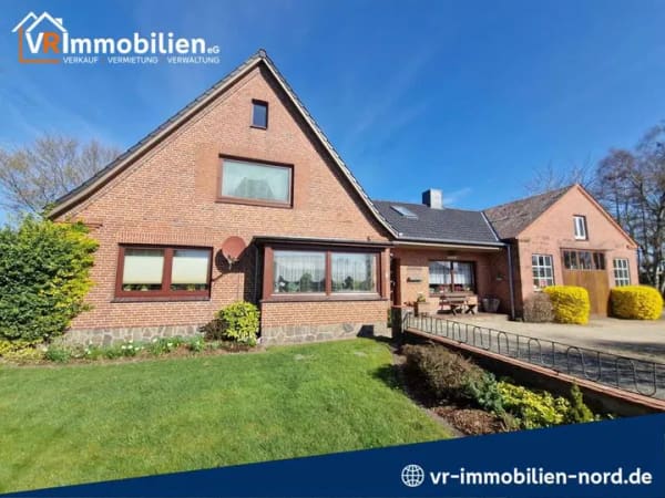 Immobilie in Dörpstedt - Charmantes Zweifamilienhaus mit Schmiede & Baugrundstück in ländlicher Umgebung - Bild 0