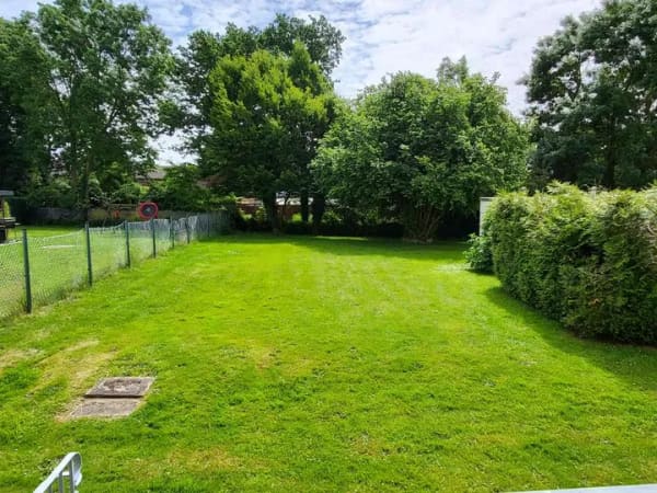 Immobilie in Aldenhoven - Gepflegtes und modernisiertes Mehrfamilienhaus mit 6 Wohnungen und 3 Garagen in Aldenhoven - Bild 2