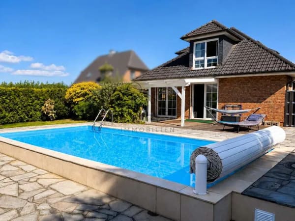 Immobilie in Bokholt-Hanredder - Familientraum mit eigenem Pool und Weitblick - Modernes Wohnen in ruhiger Lage - Bild 0