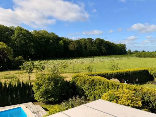 Immobilie in Bokholt-Hanredder - Familientraum mit eigenem Pool und Weitblick - Modernes Wohnen in ruhiger Lage - Bild 1