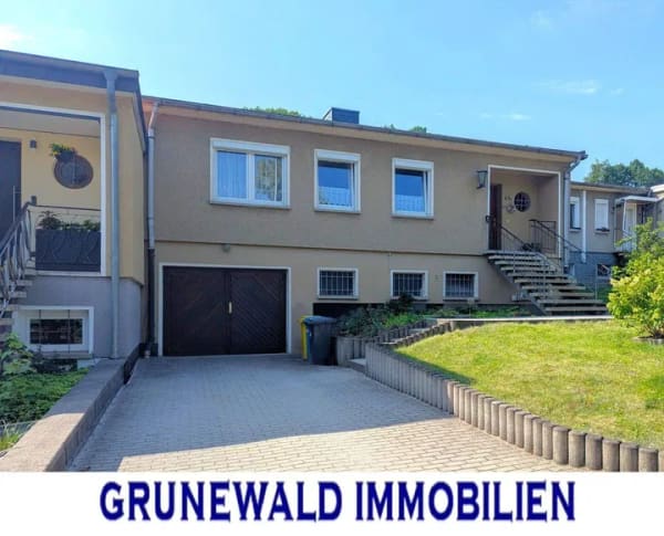 Immobilie in Eisenberg - Reihenmittelhaus mit Garage, Hobbyraum und Südterrasse. - Bild 0
