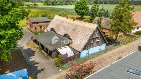 Immobilie in Ferdinandshof - Historisches Reetdachhaus mit Entwicklungspotenzial und über sechs Prozent Rendite - Bild 1