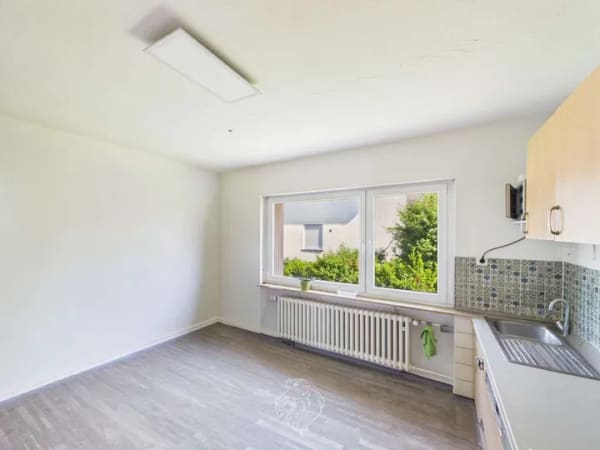Immobilie in Zellingen - Wohnen, Vermieten, Investieren – Zweifamilienhaus mit Potenzial in Zellingen - Bild 3