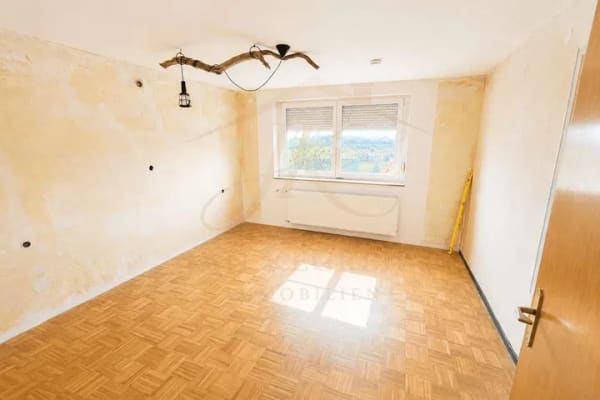 Immobilie in Münsingen - Charmantes Einfamilienhaus mit viel Potenzial für Ihre Wohnträume - Bild 4