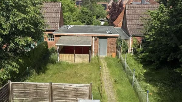 Immobilie in Mölln - Gemütliches Reihenhaus mit großer Garage - Bild 1