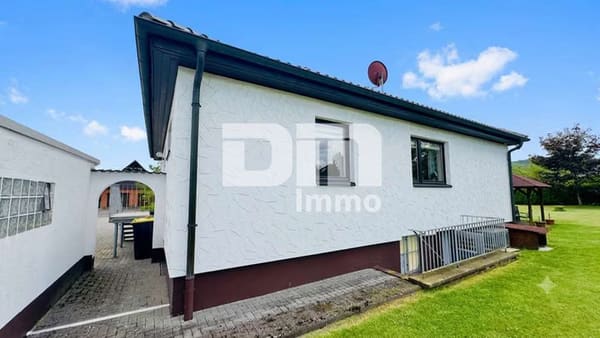 Immobilie in Calden - Solider Familien-Bungalow mit großem Potenzial in ruhiger Lage mit Wintergarten und Garage - Bild 2