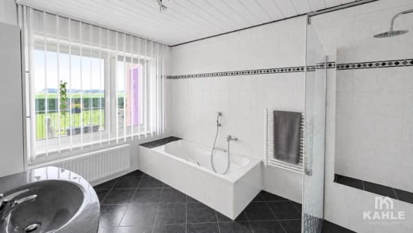 Immobilie in Sassenberg - Kaufobjekt:  Wohnglück für Großfamilie mit Blick ins Grüne in ruhiger Lage von Sassenberg-Füchtorf - Bild 4