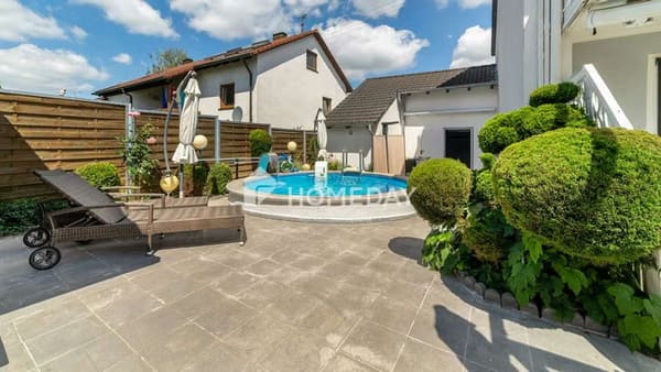 Immobilie in Dasing - Gepflegte Doppelhaushälfte mit Pool, Doppelgarage und vielseitigem Platzangebot
 - Bild 0
