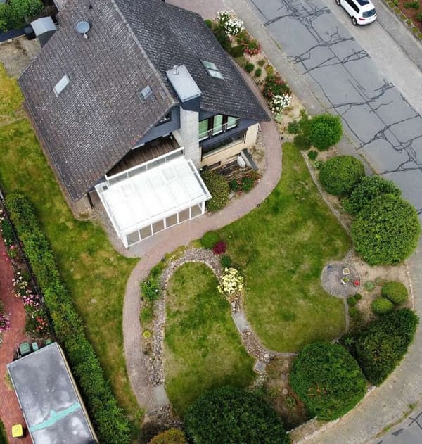 Immobilie in Melbeck - Exklusives Einfamilienhaus mit Panorama-Wintergarten, Sauna, Pelletheizung & Traumgarten in Melbeck - Bild 1