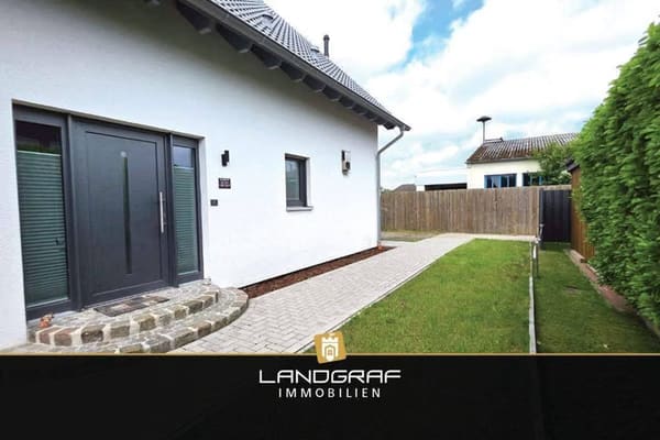 Immobilie in Harpstedt - Exklusives & modernes Einfamilienhaus mit nachhaltigem Energiekonzept und viel Platz für die Familie! - Bild 1