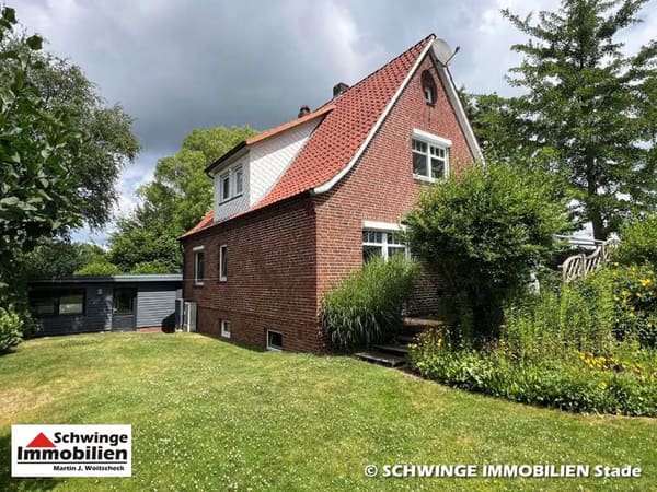 Immobilie in Fredenbeck - Modernisiertes & gepflegtes Familienhaus mit Doppelcarport in Fredenbeck zu verkaufen. - Bild 1
