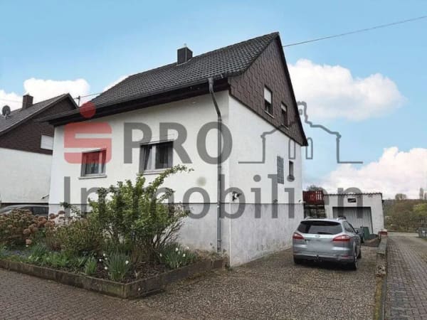 Immobilie in Riegelsberg - Zwei-/Dreifamilienhaus mit zwei Garagen und schönem Garten! - Bild 0