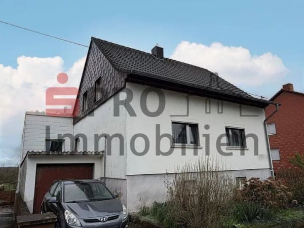 Immobilie in Riegelsberg - Zwei-/Dreifamilienhaus mit zwei Garagen und schönem Garten! - Bild 1