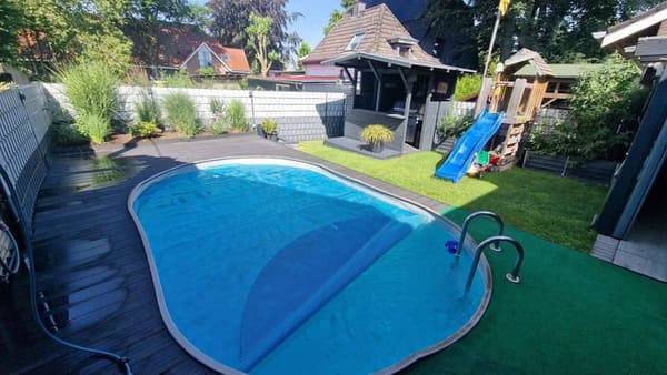 Immobilie in Hünxe - Großzügige Erdgeschosswohnung mit Pool und Garage im 2-Familienhaus - Bild 1