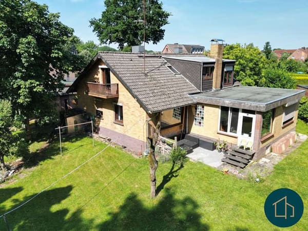 Immobilie in Sittensen - Viel Platz zum Leben: Großzügiges Wohnhaus mit Garten, Teich und eigenem Waldanteil - Bild 1