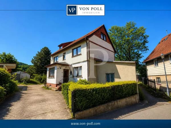 Immobilie in Ilsenburg - 1-2 Familienhaus auf 180 m² Wohnfläche, 1.500 m² Grundstück, 2 Garagen und großzügiger Garten - Bild 0