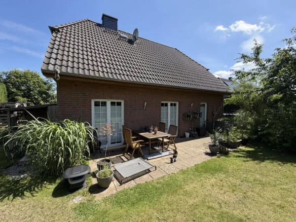 Immobilie in Thomasburg - Idyllisches Zuhause mit Kamin und großem Garten - Bild 1