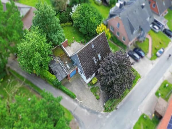 Immobilie in Syke - Solides OKAL-Fertighaus mit Dachterrasse, Garage und Garten – ruhige Wohnlage in Syke-Sörhausen - Bild 1