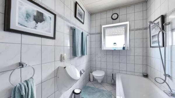 Immobilie in Hettenhausen - Repräsentatives Einfamilienhaus mit Balkon, Garage und Wintergarten - Bild 2