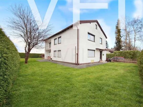 Immobilie in Kolbermoor - Freistehendes Zweifamilienhaus mit großem Grundstück in Kolbermoor – Ideal für Sanierer - Bild 2