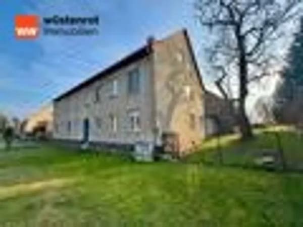 Immobilie in Niedergörsdorf - Circa 23.000€ Einnahmen durch PV-Anlage! MFH mit 5 Einheiten, Garagen und Scheune bei Jüterbog. - Bild 0