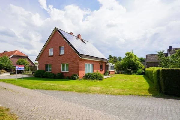 Immobilie in Weener - Familienfreundliches Wohnen in ruhiger Lage - Modernes Einfamilienhaus mit viel Platz und Komfort! - Bild 1