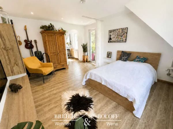 Immobilie in Bad Eilsen - Renovierte Dachgeschosswohnung mit Balkon in Bad Eilsen - Bild 1