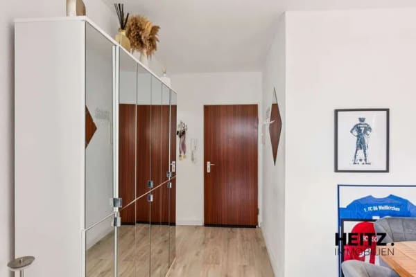 Immobilie in Steinbach - Modernisierte 4-Zimmer Eigentumswohnung mit beeindruckendem Skylineblick - Bild 4