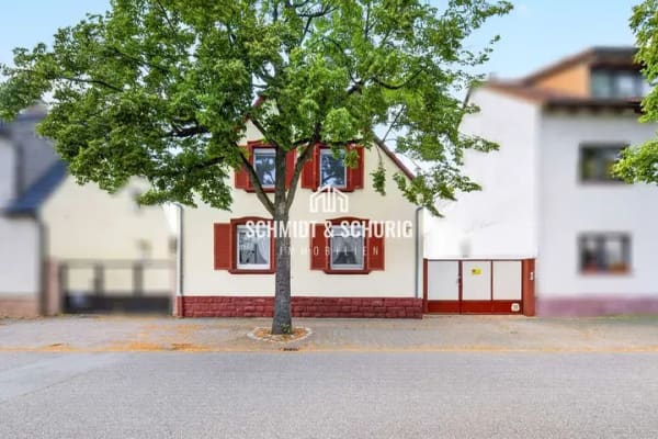 Immobilie in Waghäusel - Vermietetes Einfamilienhaus in gewachsener Wohnlage – solide Basis mit Gestaltungspotenzial - Bild 1