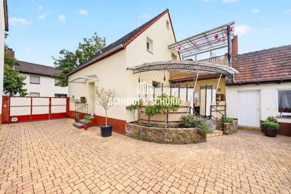Immobilie in Waghäusel - Vermietetes Einfamilienhaus in gewachsener Wohnlage – solide Basis mit Gestaltungspotenzial - Bild 2