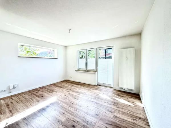 Immobilie in Weyhe - Attraktives 3-Parteienhaus in Weyhe: 297m² Wohnfläche,  großes Grundstück & sofort verfügbar - Bild 2