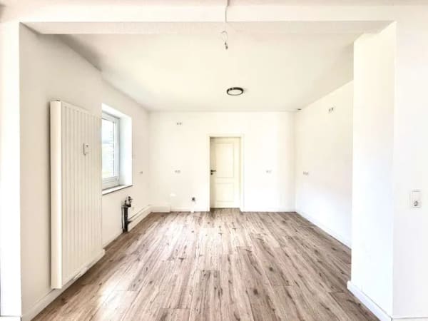 Immobilie in Weyhe - Attraktives 3-Parteienhaus in Weyhe: 297m² Wohnfläche,  großes Grundstück & sofort verfügbar - Bild 3