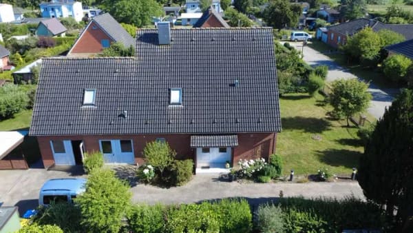 Immobilie in Jürgenshagen - Charmantes Einfamilienhaus mit Einliegerwohnung und großzügigen Nutzflächen - Bild 1